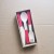 Boxed knives, forks, spoons, 8 large red each 