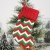 M1-5 large knitted socks with green, red, and white stripes  + $2.82 