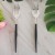 8 sets of black sticks and silver forks  + $0.44 